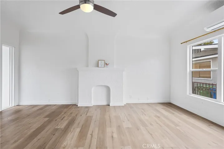 Spacious Open Floor Plan with Ceiling Fan