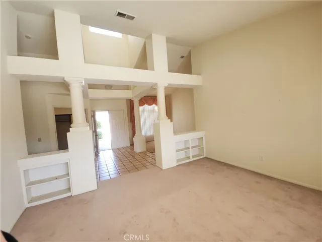 Living room with high ceilng