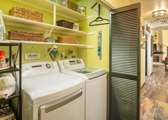 Actual color. Hall location has upper shelves. Washer and Dryer convey.