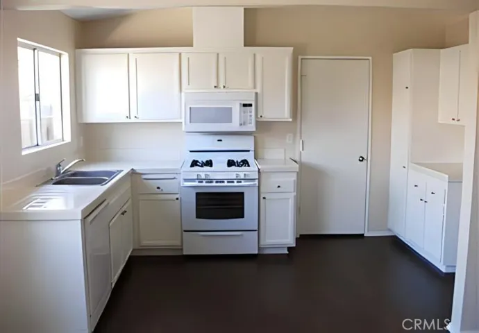 Kitchen door to over size 2 car garage