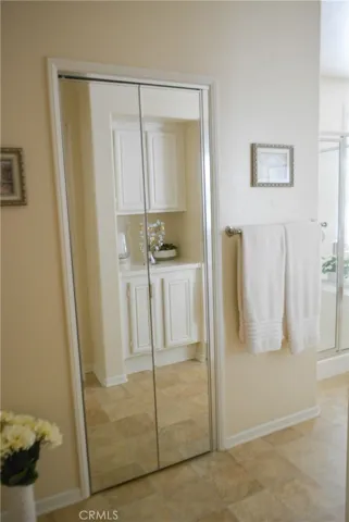 Primary Bedroom Closets are mirrored