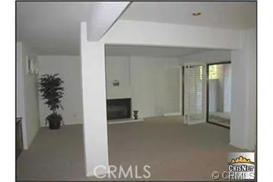 Living room area with fireplace and gas log