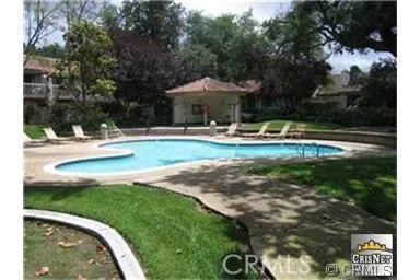 Pool area outside unit with direct entrance from patio. Has outside restrooms and spa
