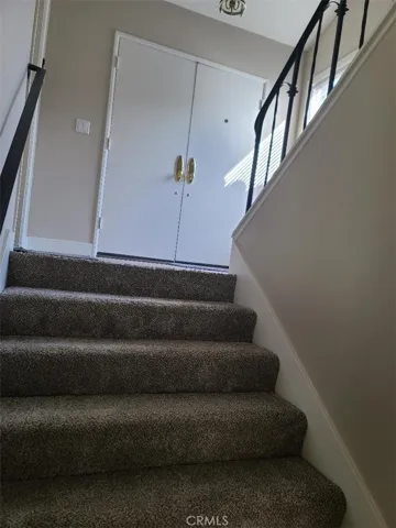 Inside landing out to garage and down to living area or up to 3 bedrooms+2 baths