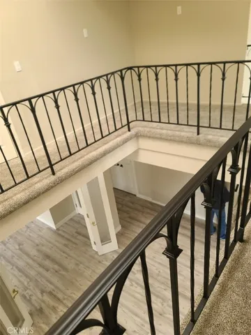 upstairs hallway to 3 bedrooms & 2 double sink baths
