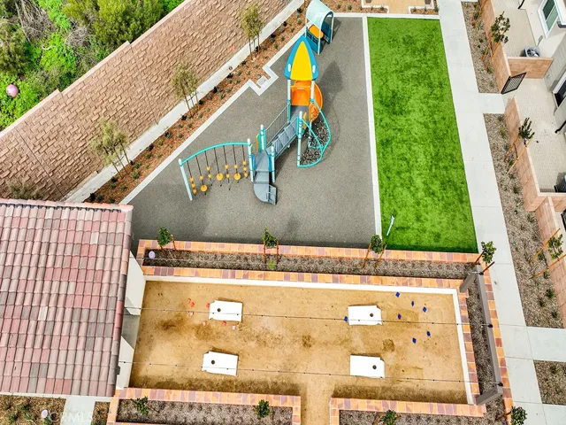 play area, bbq, and cornhole