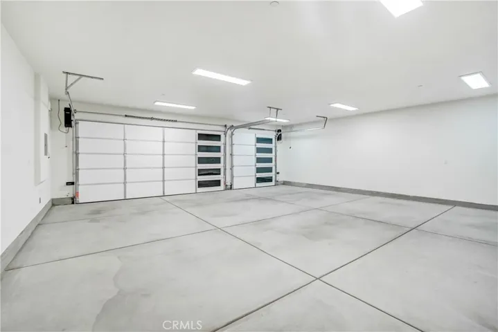 Extra Wide Garage with 9 Foot Doors and side motors powered by Bluetooth