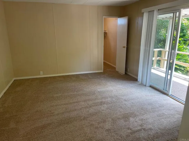 Primary Bedroom with rear deck