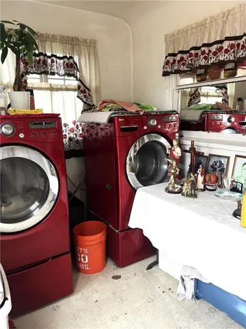 Laundry room next to Kitchen