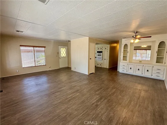 Living room open to dining area and kitchen
