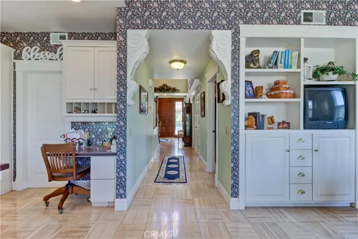 hallway with custom wood carvings