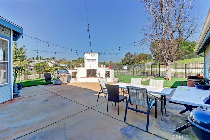 Outdoor living area with fireplace
