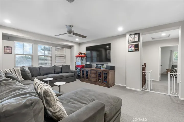 Loft has ceiling fan 3 windows!