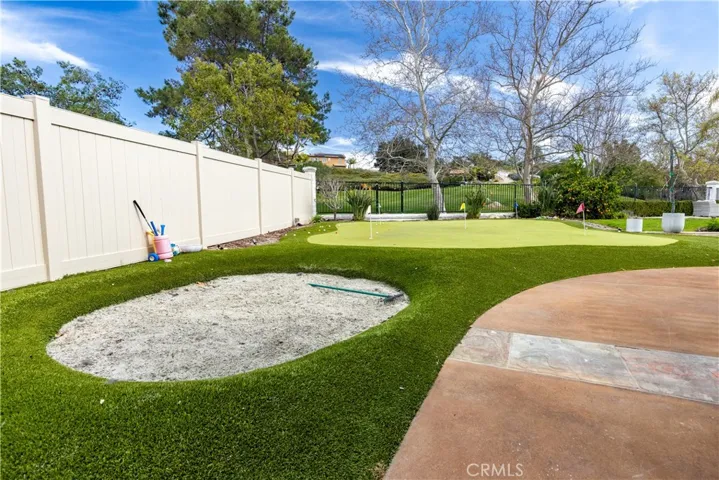 GOLFER'S DREAM HOME! Professional putting green and sand trap!