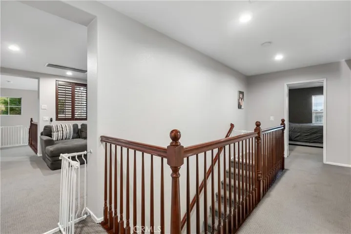 Second staircase leads to 3 secondary bedrooms for flowing floor plan!