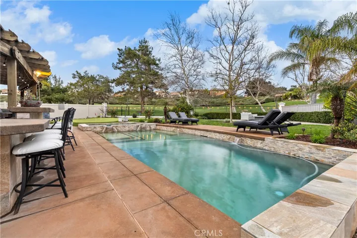 RESORT STYLE BACKYARD! Located on the Redhawk Golf Course 15th Tee! Salt water pool and spa with all new equipment in 2021!