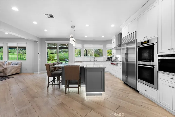 Kitchen has Subzero refrigerator and dimmable under cabinet lighting!