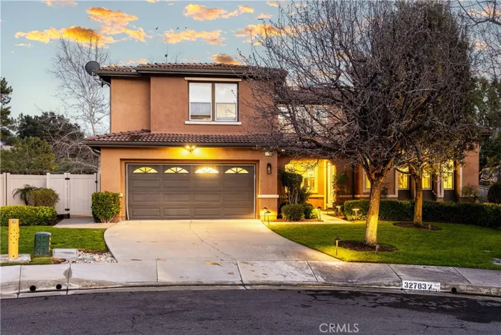 Welcome home! Great curb appeal. 3 car tandem garage!