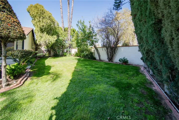 Block walls throughout for security. Landscape back yard.