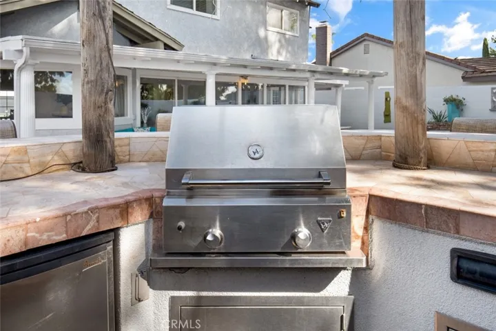 Built in BBQ space with area to sit and eat.