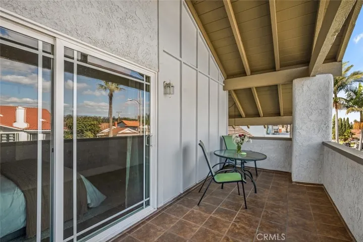 Primary balcony to unwind and enjoy the fresh air.