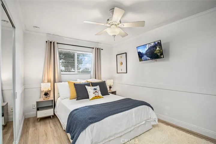 Third secondary bedroom with mirror wardrobe sliders.