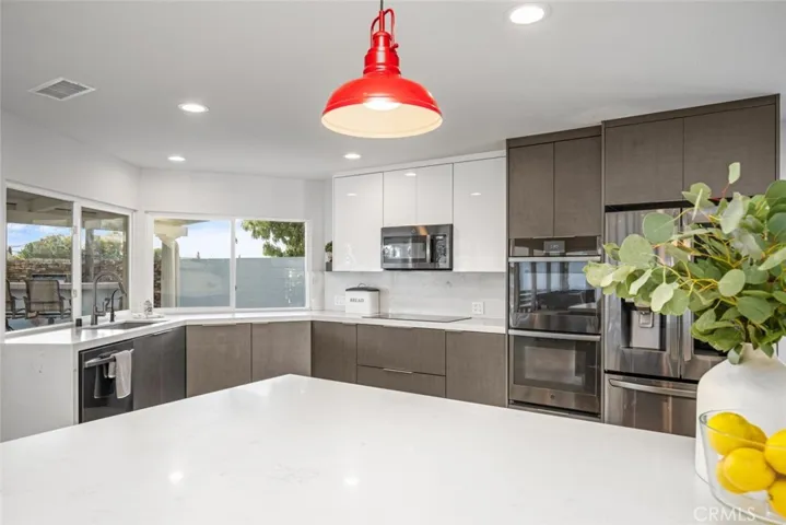 Many upgrades in the kitchen from quartz counter top to updated appliances.