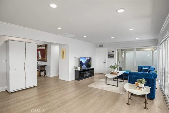 Large family room with plenty of windows and natural light.