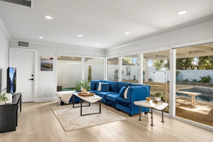 Light bright family room with LVP flooring.