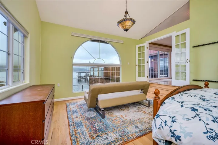 Primary bedroom has large wondows to enjoy the view