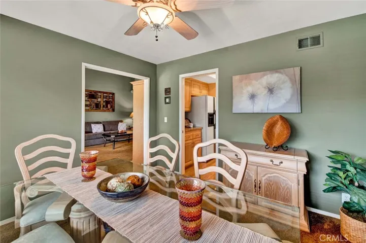 Formal Dining Room with Direct Access to Both Kitchen and Family Room