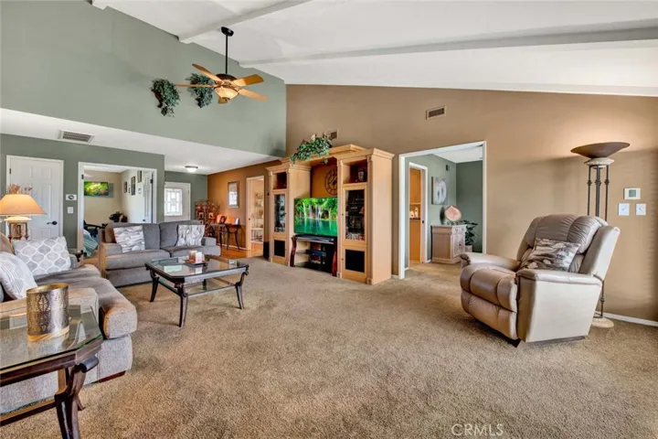 Living Room with Soaring Open-Beam Ceiling