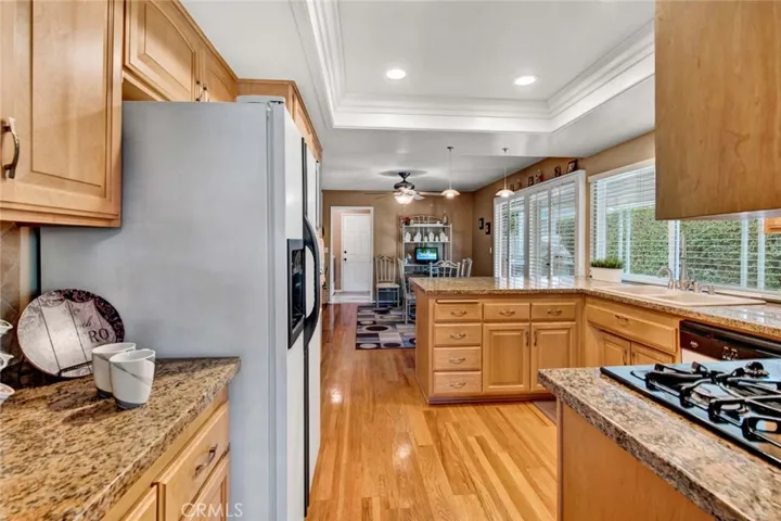 Large Open Kitchen with Granite Counter Tops, Plenty of Counter Space and Lots of Windows for Natural Light