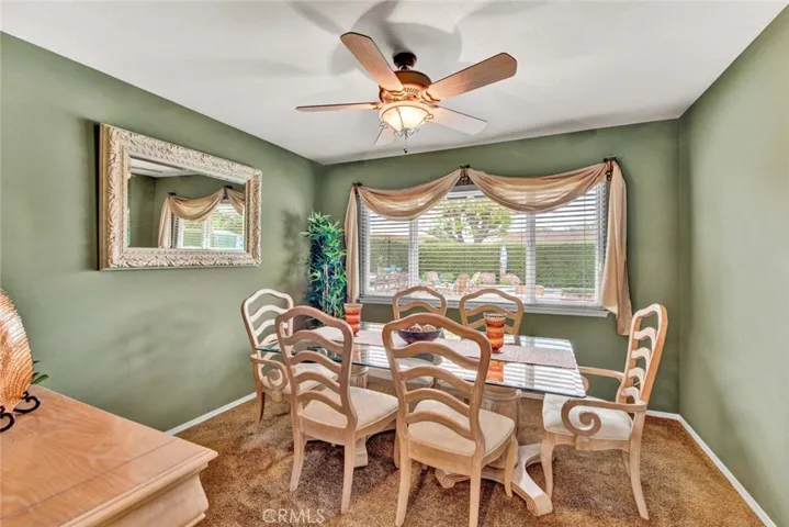 Formal Dining Room Over Looks Oasis Backyard