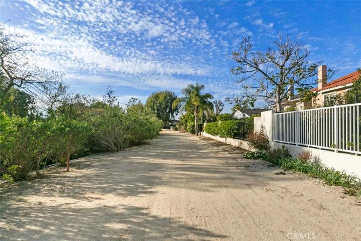 Wonderful creekside walking & biking trail across the street, behind this beautiful home.