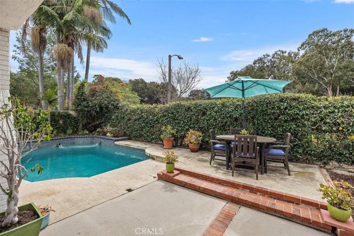Enjoy your meals outside by the pool.