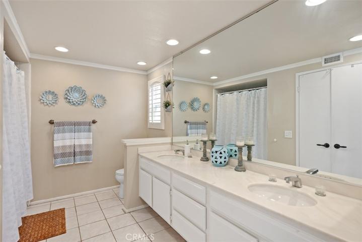 Spacious primary bathroom with large walk in closet.