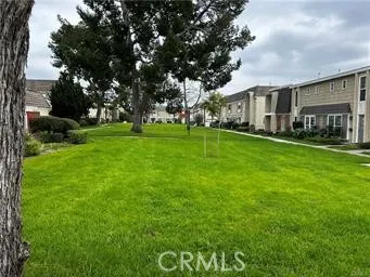 Spacious greenbelts plus a pool.