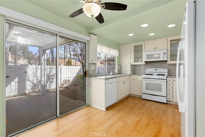 Kitchen showing slider to patio