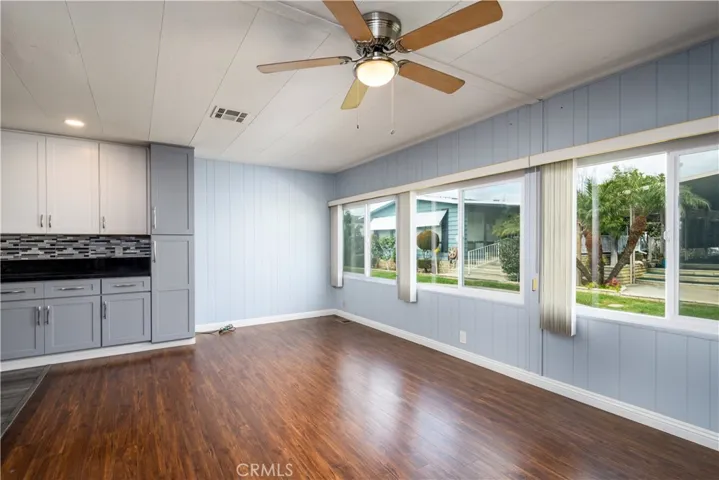 Kitchen opens up to this spacious family room/dining room