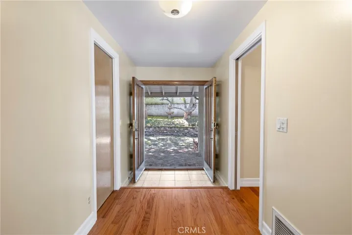Wood double front doors looking out