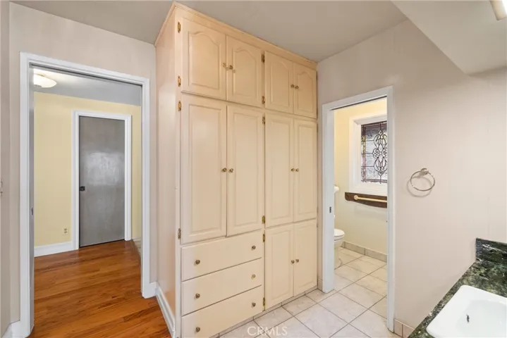 Master Bath Suite. Stained Glass window is visible for privacy