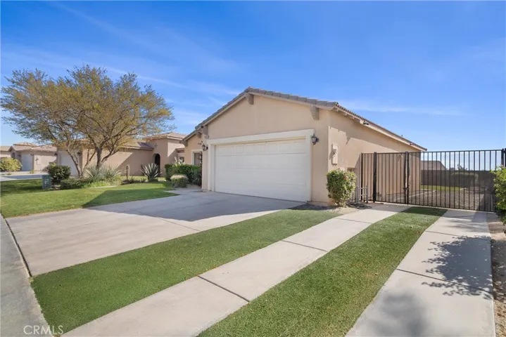 Gate access to backyard and long space for potential RV/boat/ATV parking