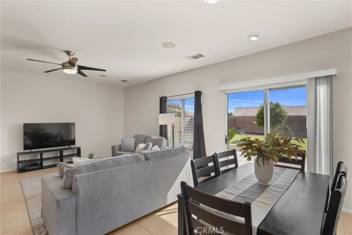 The dining area opens to the patio, perfect for al-fresco celebrations