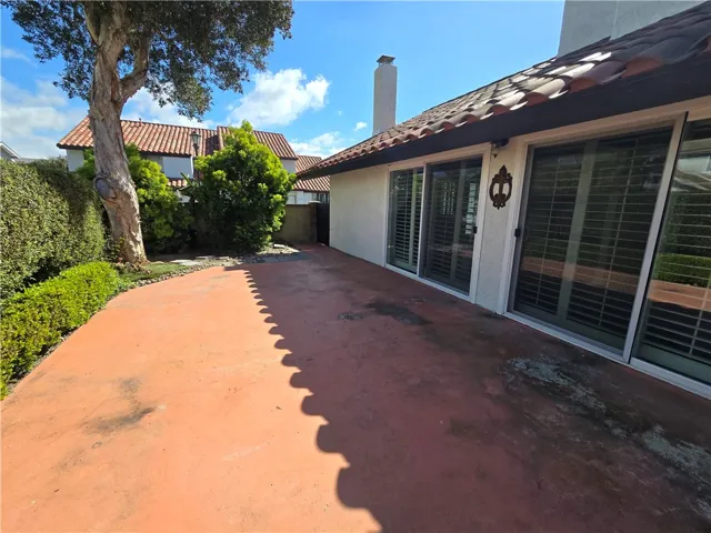 Direct access from the living room and dining room to your private patio located on a deep green belt.
