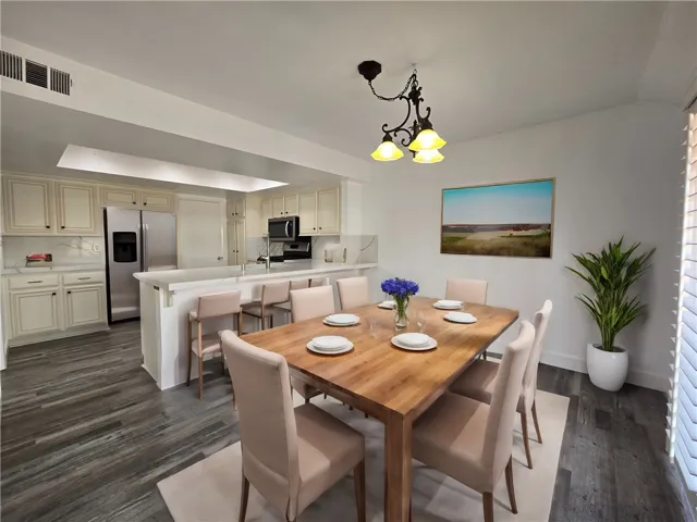 Dining area has room for a table and counter top seating.