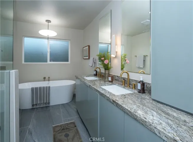 Primary bathroom with soaking tub and walk in shower