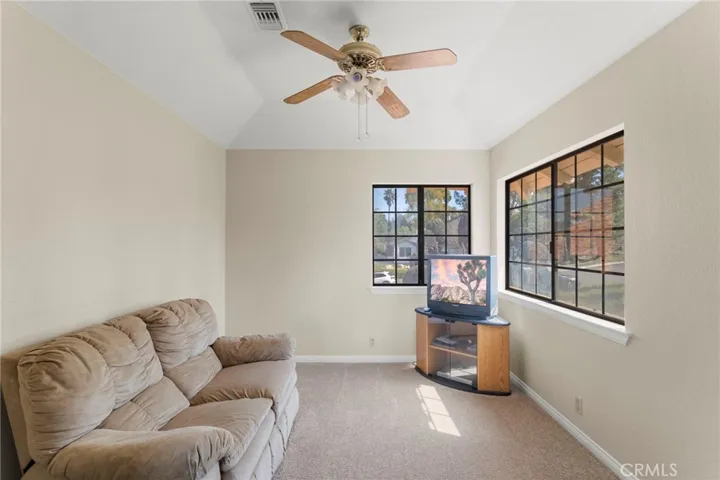 Private sitting room attached to primary bedroom.