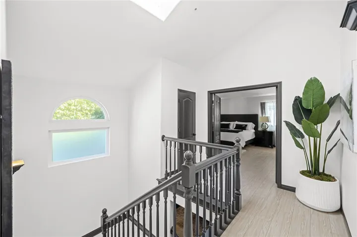 Upstairs hallway with skylight