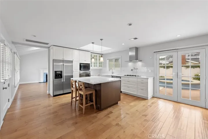 Enjoy lots of natural light, spacious counter space and beautiful French doors which brings lots of light while cooking dinner and entertaining.